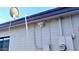 Exterior of a home featuring conduit, a meter box, and a satellite dish at 7754 W Mitchell Dr, Phoenix, AZ 85033
