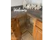 View of a kitchen cabinet featuring a corner storage system for optimized organization at 7754 W Mitchell Dr, Phoenix, AZ 85033