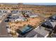 Aerial view of a pickleball court and community homes in a desert landscape at 8043 E Jaeger St, Mesa, AZ 85207