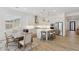 Bright kitchen with white cabinets, stainless steel appliances, and a center island at 8043 E Jaeger St, Mesa, AZ 85207
