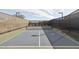 Outdoor pickleball court featuring new surfacing and fencing on a sunny day at 8043 E Jaeger St, Mesa, AZ 85207