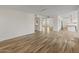 Open-concept living space featuring wood-style floors and bright natural light at 8340 E Rowel Rd, Scottsdale, AZ 85255