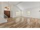 Spacious living room featuring hardwood floors and a high ceiling at 8340 E Rowel Rd, Scottsdale, AZ 85255