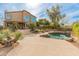 Inviting pool surrounded by lush landscaping, offering a private and refreshing outdoor escape at 8340 E Rowel Rd, Scottsdale, AZ 85255