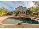 Sparkling pool surrounded by lush landscaping, creating a tranquil oasis for relaxation and recreation at 8340 E Rowel Rd, Scottsdale, AZ 85255