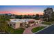 Expansive home with a desert landscape, featuring a large front yard and mountain views during sunset at 8821 N 9Th Ave, Phoenix, AZ 85021