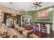 Bright living room with a stylish bar area, comfortable seating, and seamless access to the outdoor patio at 8821 N 9Th Ave, Phoenix, AZ 85021
