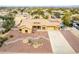 Aerial view of a single-story home with desert landscaping and a long, paved driveway at 9768 W Prospector Dr, Queen Creek, AZ 85144
