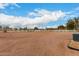 Large, flat backyard with potential for various recreational activities and landscaping at 9768 W Prospector Dr, Queen Creek, AZ 85144