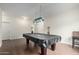 Tiled game room featuring a pool table and ambient lighting at 9768 W Prospector Dr, Queen Creek, AZ 85144