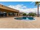 Backyard pool with clear water at 9768 W Prospector Dr, Queen Creek, AZ 85144