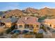 Stunning home features a private pool, outdoor patio, and breathtaking mountain views at 11617 E Raintree Dr, Scottsdale, AZ 85255