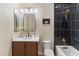 A stylish bathroom features a swan picture, a vanity, and a modern navy blue shower at 11617 E Raintree Dr, Scottsdale, AZ 85255