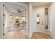 Inviting home office featuring hardwood floors, lots of natural light, and a view of the surrounding landscape at 11617 E Raintree Dr, Scottsdale, AZ 85255