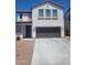 Well-maintained two-story home features an attached two car garage at 1170 E Taylor Trl, San Tan Valley, AZ 85143