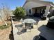 Cozy backyard with a table set with a great view to enjoy the backyard at 12008 W Acapulco Dr, El Mirage, AZ 85335
