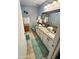Bright bathroom with granite counters, white cabinets, and updated fixtures at 12008 W Acapulco Dr, El Mirage, AZ 85335