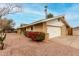 Charming single-story home featuring a brick facade, two car garage, and vibrant flower bushes at 1226 E Fairmont Dr, Tempe, AZ 85282