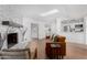 Inviting living room features a painted brick fireplace, skylight, and open layout at 1226 E Fairmont Dr, Tempe, AZ 85282