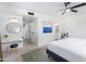 Bright main bedroom features ensuite bathroom and a makeup vanity with round mirror at 1226 E Fairmont Dr, Tempe, AZ 85282