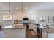 Kitchen featuring a large island with sleek countertops and stainless steel appliances at 15993 W Poinsettia Dr, Surprise, AZ 85379