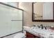 Bathroom features frosted glass shower doors, granite countertops, and modern fixtures at 1633 N Woodruff --, Mesa, AZ 85207