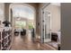 A tiled entryway leading to the living room, offering a view of the home's open floor plan at 1633 N Woodruff --, Mesa, AZ 85207