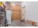 Functional garage featuring built-in cabinets, an exterior access door, and practical storage solutions for organized living at 1633 N Woodruff --, Mesa, AZ 85207