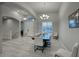 The dining room has an elegant chandelier, arched doorways, and tile floors at 20061 E Cherrywood Ct, Queen Creek, AZ 85142