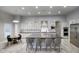 Bright open kitchen featuring a large island, stainless steel appliances, and modern finishes at 20061 E Cherrywood Ct, Queen Creek, AZ 85142
