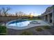 Backyard with pool and spa combo, waterfall feature, outdoor seating, and sport court at 20061 E Cherrywood Ct, Queen Creek, AZ 85142