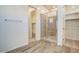 Bright bathroom featuring a glass enclosed shower with tile surround at 21255 W Ashland Ave, Buckeye, AZ 85396