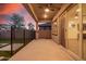 Covered patio with neutral floors, ceiling fan and view of the backyard at 21255 W Ashland Ave, Buckeye, AZ 85396