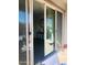 Sliding glass doors provide seamless access to the outdoor living space and views of the backyard and patio at 21255 W Ashland Ave, Buckeye, AZ 85396