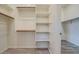 A walk-in closet provides ample shelf storage at 21255 W Ashland Ave, Buckeye, AZ 85396
