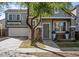 Charming front exterior of a two-story home with stone accents and manicured landscaping at 2315 E Pecan Rd, Phoenix, AZ 85040