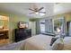 Spacious main bedroom with ensuite bathroom, natural light, and neutral colors at 2315 E Pecan Rd, Phoenix, AZ 85040