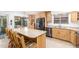 Kitchen with light wood cabinets and stainless-steel appliances at 2407 W Paradise Ln, Phoenix, AZ 85023