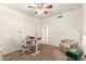 A cozy office offers a practical layout with ample light and versatile space for work or study at 2407 W Paradise Ln, Phoenix, AZ 85023