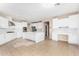 Spacious white kitchen with an island and stainless steel appliances at 26220 N 50Th Dr, Phoenix, AZ 85083