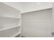 Bright walk-in closet featuring shelving at 26635 W Covey Ln, Buckeye, AZ 85396
