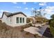 Charming home exterior showcasing well-maintained landscaping, a neutral color palette, and inviting curb appeal at 26635 W Covey Ln, Buckeye, AZ 85396