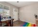 Entryway featuring a rainbow rug and natural light at 2925 W Highland Ave, Phoenix, AZ 85017