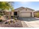 Charming single-story home featuring desert landscaping, a two-car garage, and an inviting facade at 2951 W Plum Hollow Dr, Anthem, AZ 85086