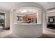 A partial view of the kitchen from an adjacent room shows the stainless steel appliances at 2951 W Plum Hollow Dr, Anthem, AZ 85086