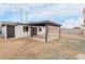 Spacious backyard featuring a covered patio, ideal for relaxing and enjoying the outdoor living space at 3217 E Friess Dr, Phoenix, AZ 85032