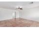 Bright living room with tile flooring, neutral walls, and arched doorways for a smooth transition at 3217 E Friess Dr, Phoenix, AZ 85032