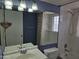 A full bathroom featuring a large mirror, vanity, toilet, and a shower/tub combo at 349 E Thomas Rd # E402, Phoenix, AZ 85012