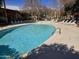 Outdoor swimming pool with lounge chairs around the perimeter for relaxing at 349 E Thomas Rd # E402, Phoenix, AZ 85012