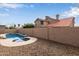 Backyard pool area with desert landscaping at 4129 E Nighthawk Way, Phoenix, AZ 85048